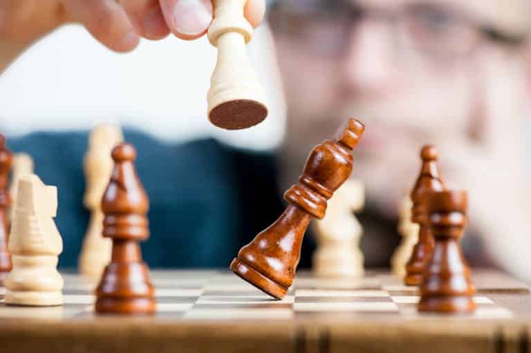 Close-up of a chess game symbolizing business owners making the right moves after tax season