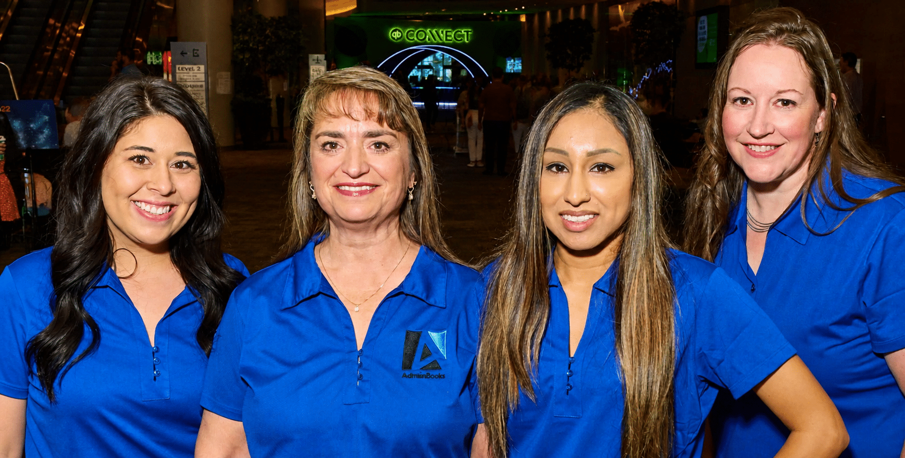 Four team members of AdminBooks at QuickBooks Connect